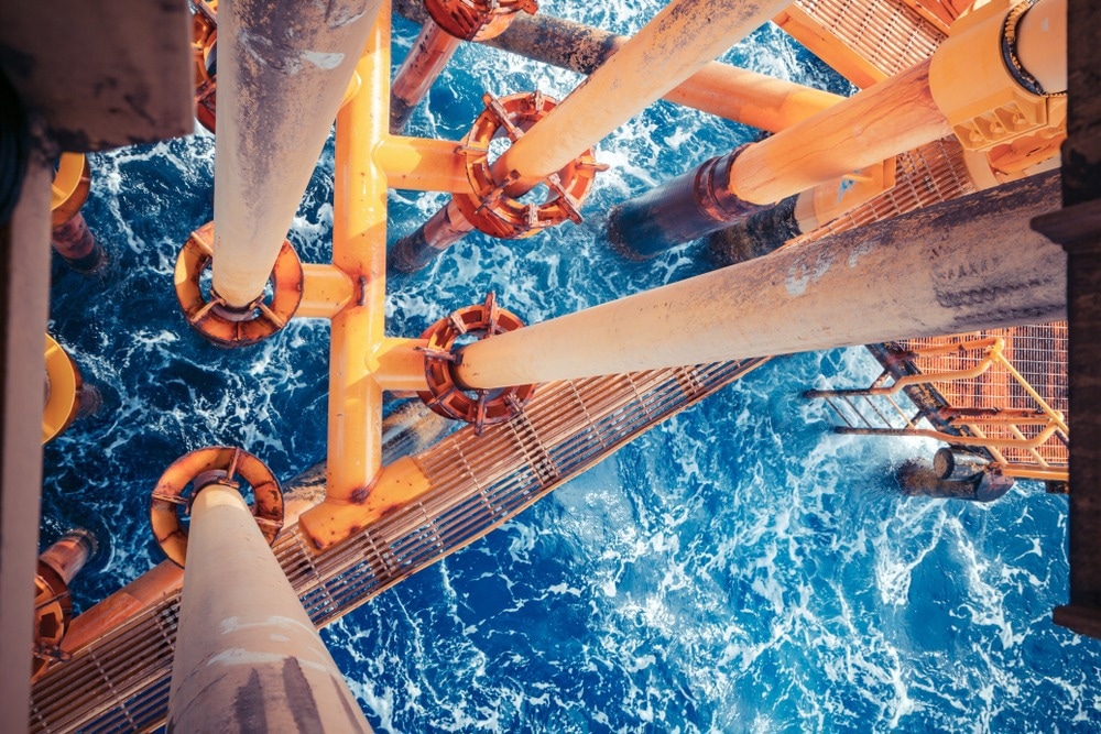 Offshore drill yellow oil and gas production petroleum pipeline.