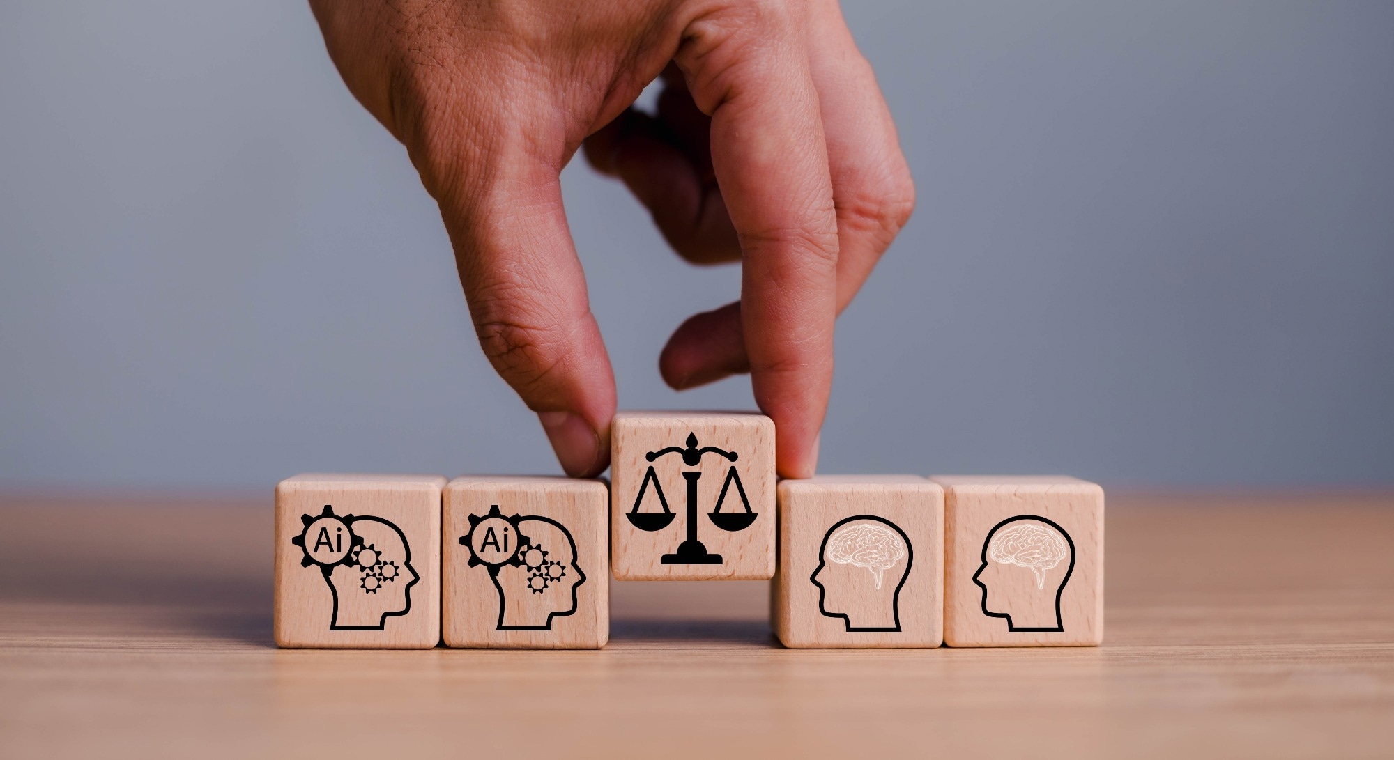 Diagram illustrating AI ethics and regulation, with blocks of policy and technology icons and a central balance scale symbolising the balance between human oversight and AI systems.