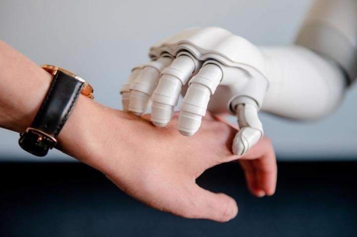 People Patted by Robot While Conversing Report Better Emotional State