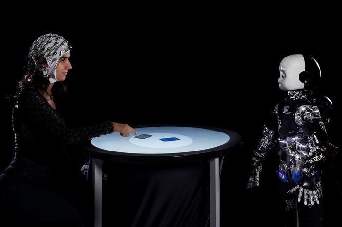 Research Reveals Delay in Human Brain Process While Gazing at a Robot.