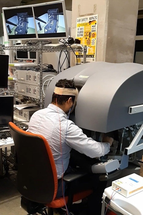Cerebellum Stimulation Accelerates Surgical Proficiency in Virtual and Real Environments