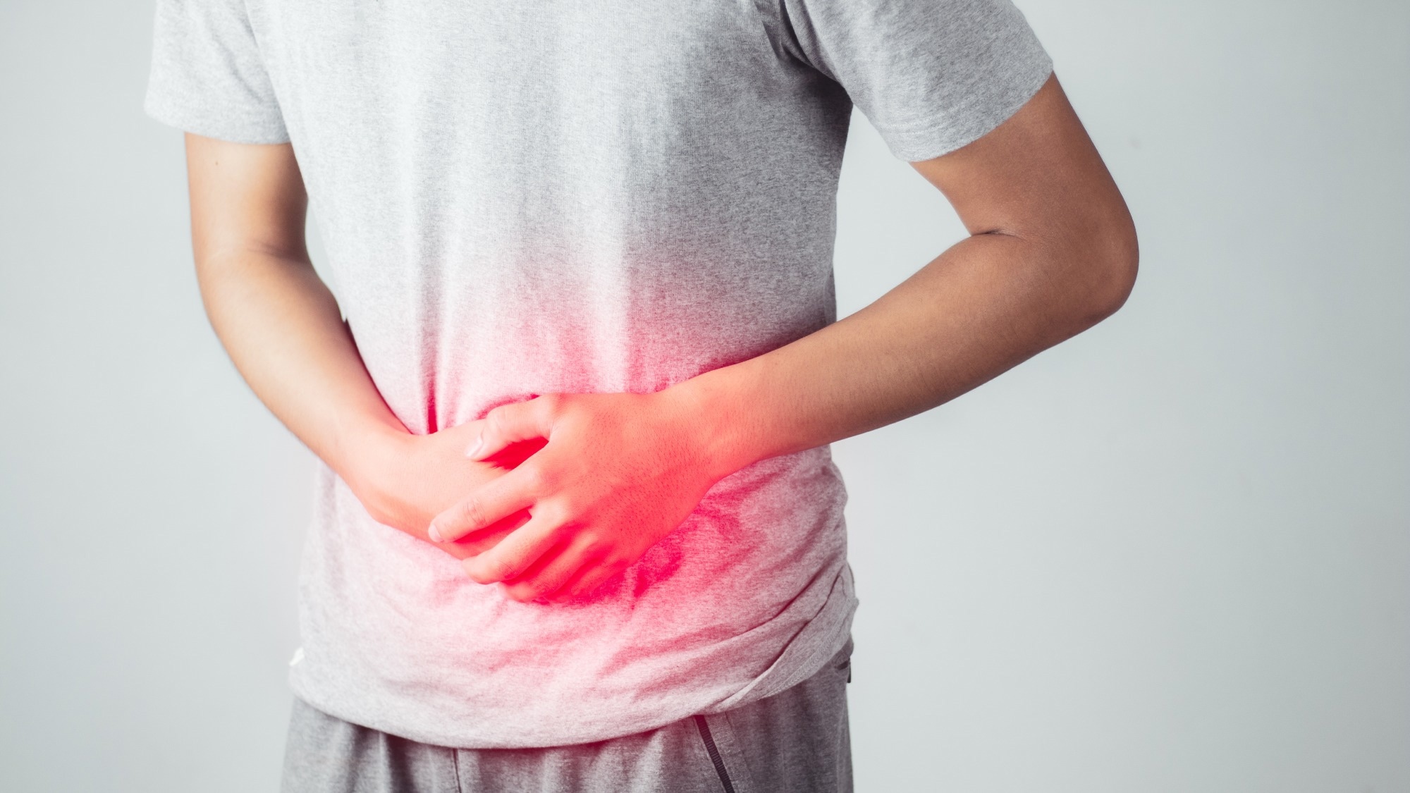 Image depicting man with stomach ache.