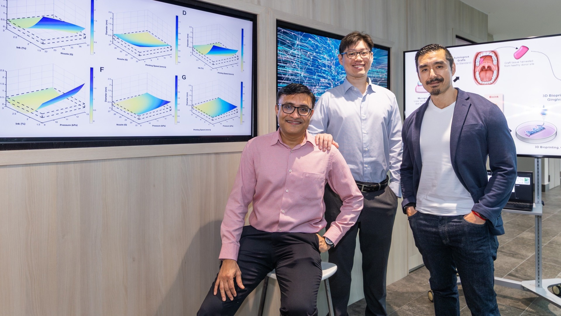 Assistant Professor Gopu Sriram (left) and Dr Jacob Chew (middle) from NUS Faculty of Dentistry, together with Professor Dean Ho (right) from the Department of Biomedical Engineering in the College of Design and Engineering at NUS, showcasing their groundbreaking work on AI-driven 3D bioprinting for personalized gingival tissue grafts. The team’s novel approach seeks to make dental procedures less invasive while enhancing patient outcomes
