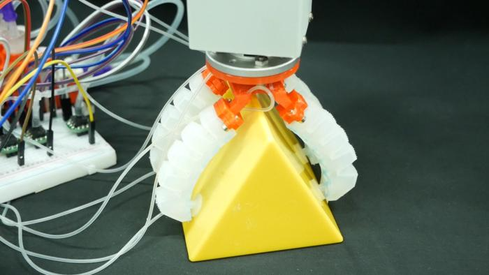 Suction cups using suction intelligence to grasp object.
