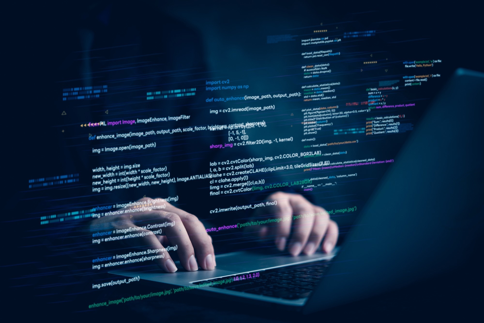Hands typing on laptop with programming code on screen.