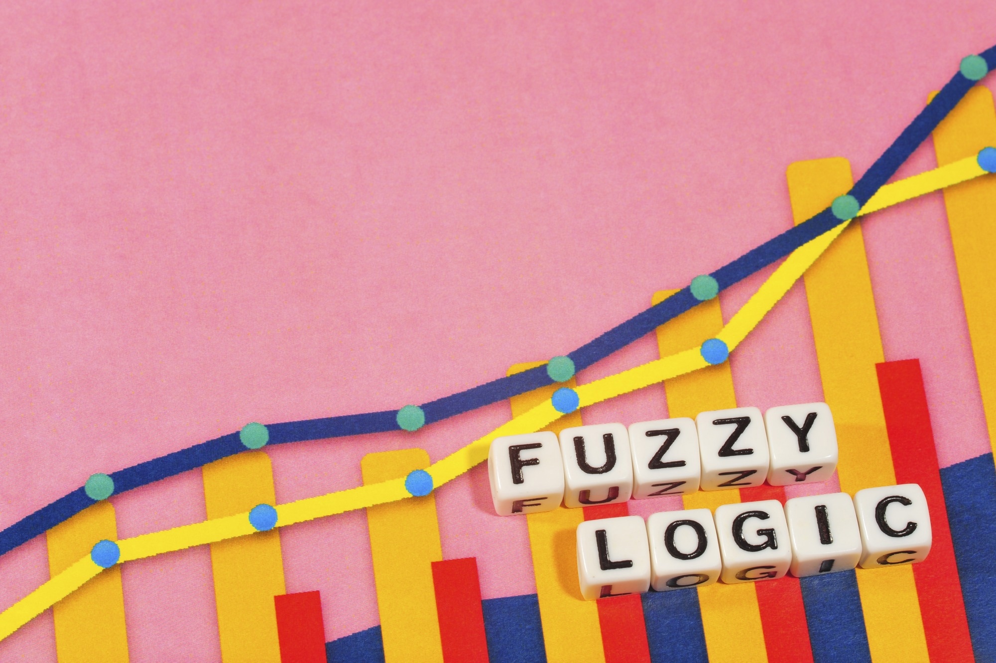 The word "Fuzzy Logic" spelt out on squares on a pink background.