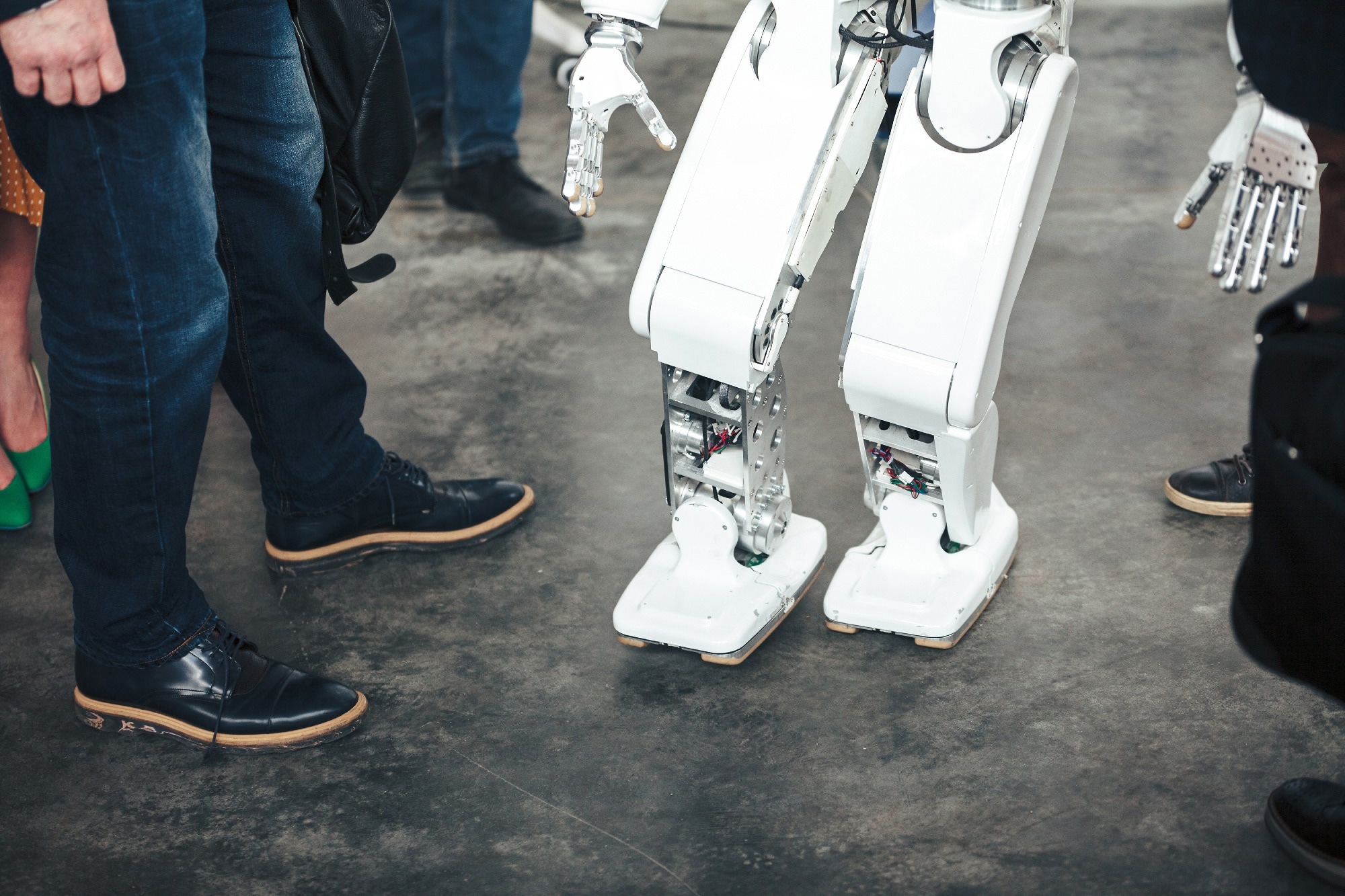 Modern white futuristic humanoid robot close up shot