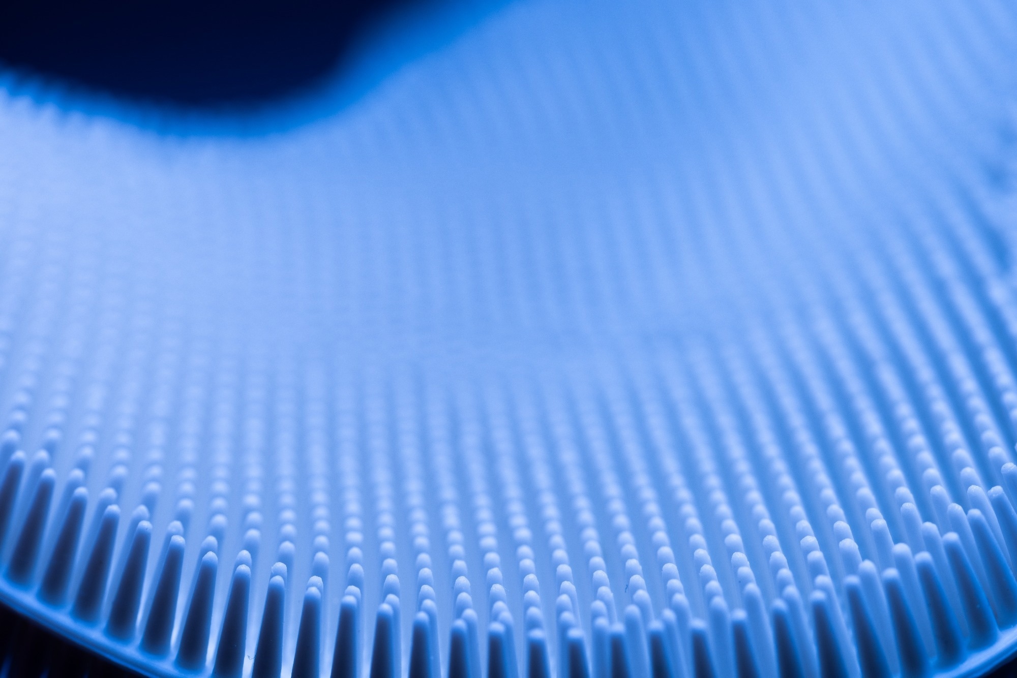 Flexible polymer material being stretched.