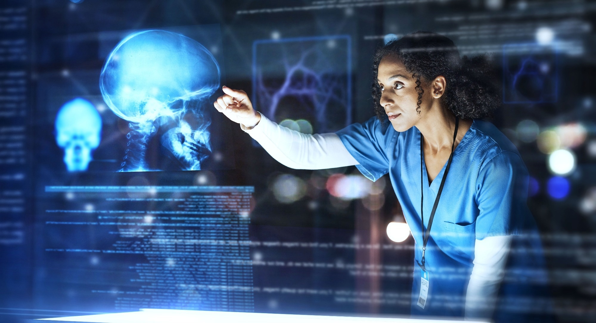 Futuristic skull scan being analyzed by a female scientist