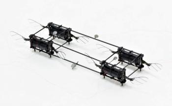 Resilient, Eight-Wing RoboBee Powered by Soft Artificial Muscles