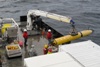 Autonomous Underwater Vehicles Photograph Risky Regions of the Ocean Floor