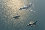 Unmanned Combat Air Vehicle Flies in Formation with Other Aircraft