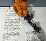 KUKA Robot Writes Manuscript of the Torah at the Berlin Jewish Museum