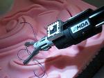 Space-Inspired Robotic Surgical Arm for Delicate Pediatric Specialties