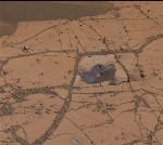 NASA's Curiosity Rover Delivers Drilled Reddish Rock Powder to CheMin Instrument