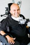 Implanted Neural Prosthetic Devices Control Robotic Arm