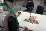 Three Robots Use Feedback Loop Concept to Blur Line Between Human and Machine Creativity