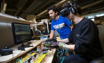 Soft Robotics-Powered Glove to Interact with Virtual Reality Environments