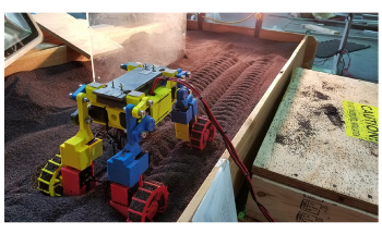 New Mini Rover with Complex Locomotion Techniques can Climb Sand Hills