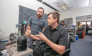 Wearable Robotic Armband Enables Users of Prosthetic Hands to Have Better Dexterity